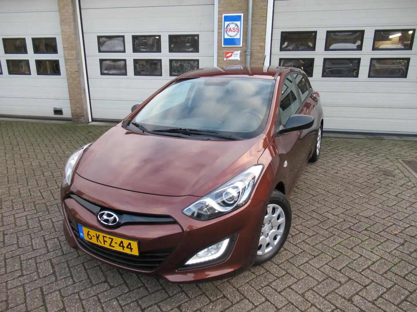 Hyundai i30 1.4i i-Drive Cool Bruin - 1