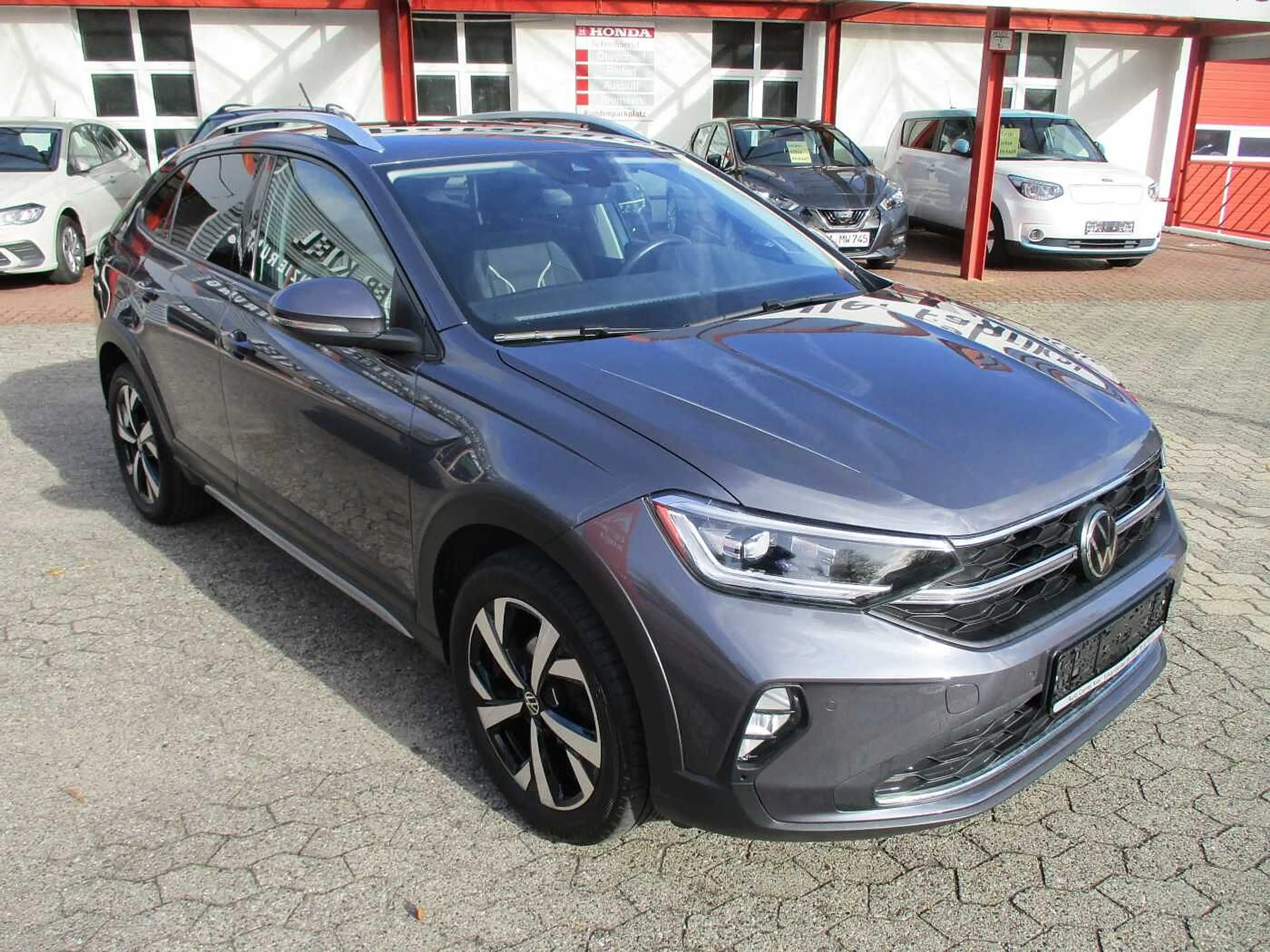 Volkswagen Taigo 1.0 TSI OPF Style — photo 4