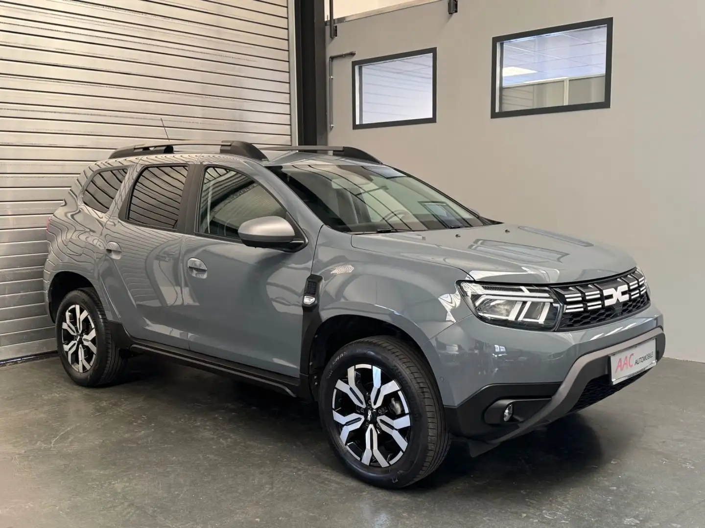 Dacia Duster II Journey/Navi/CarPlay/360°Cam/KeyLess Grau - 1