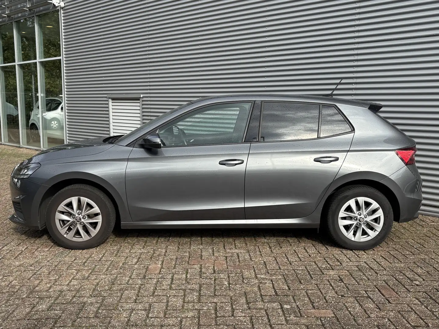 Skoda Fabia 1.0 TSI Ambition | Navigatie | Cruise | Airco | Se Gris - 2