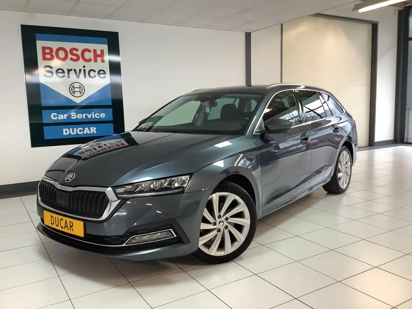 Skoda Octavia Combi 1.4 TSI iV PHEV Business Edition Trekhaak te Gris - 1