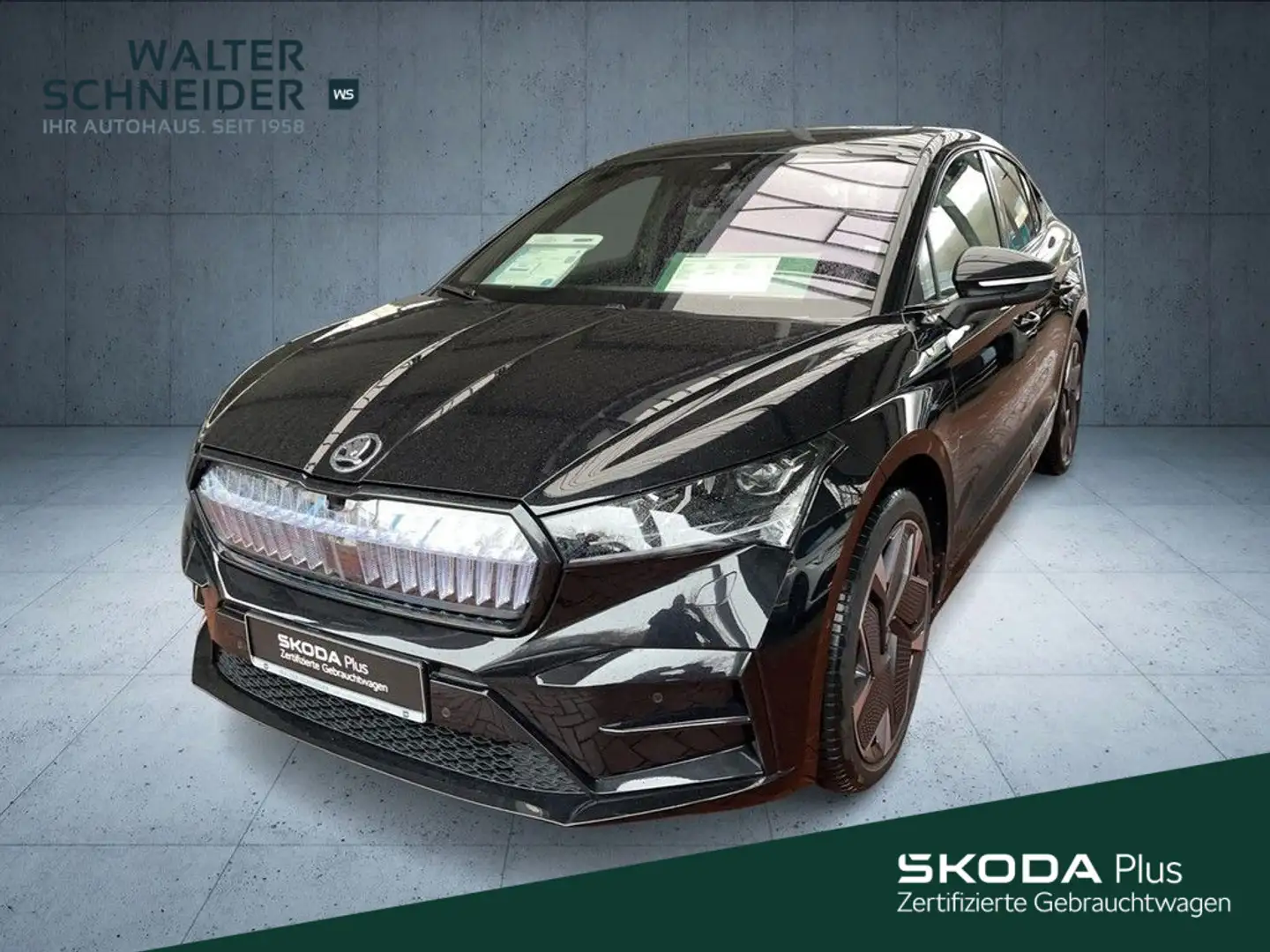 Skoda Enyaq Coupé 4x4 RS Suite Navi AHK Pano Schwarz - 1