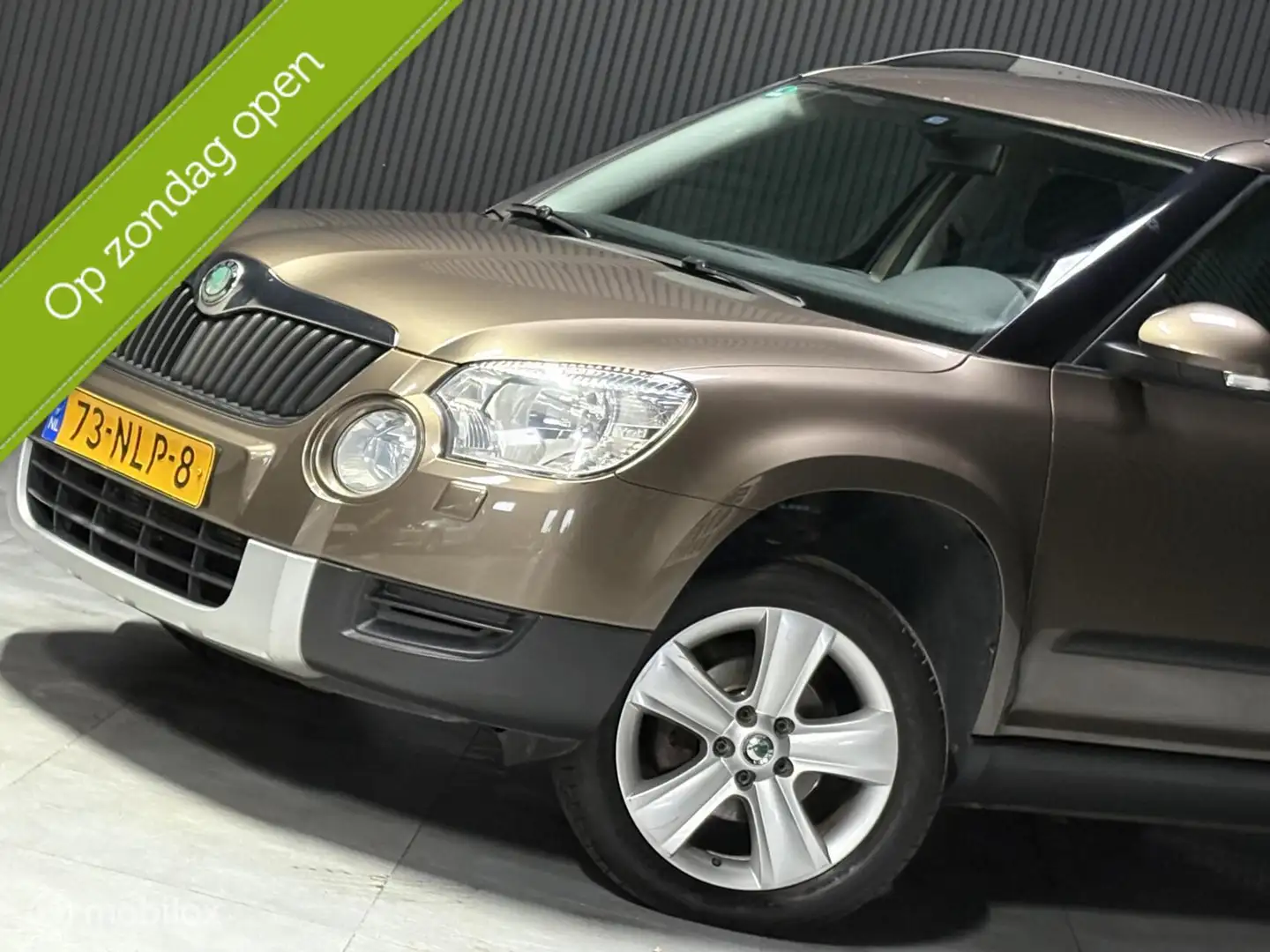 Skoda Yeti 1.4 TSI Ambition - Trekhaak - Multimedia - Parkeer Bruin - 2