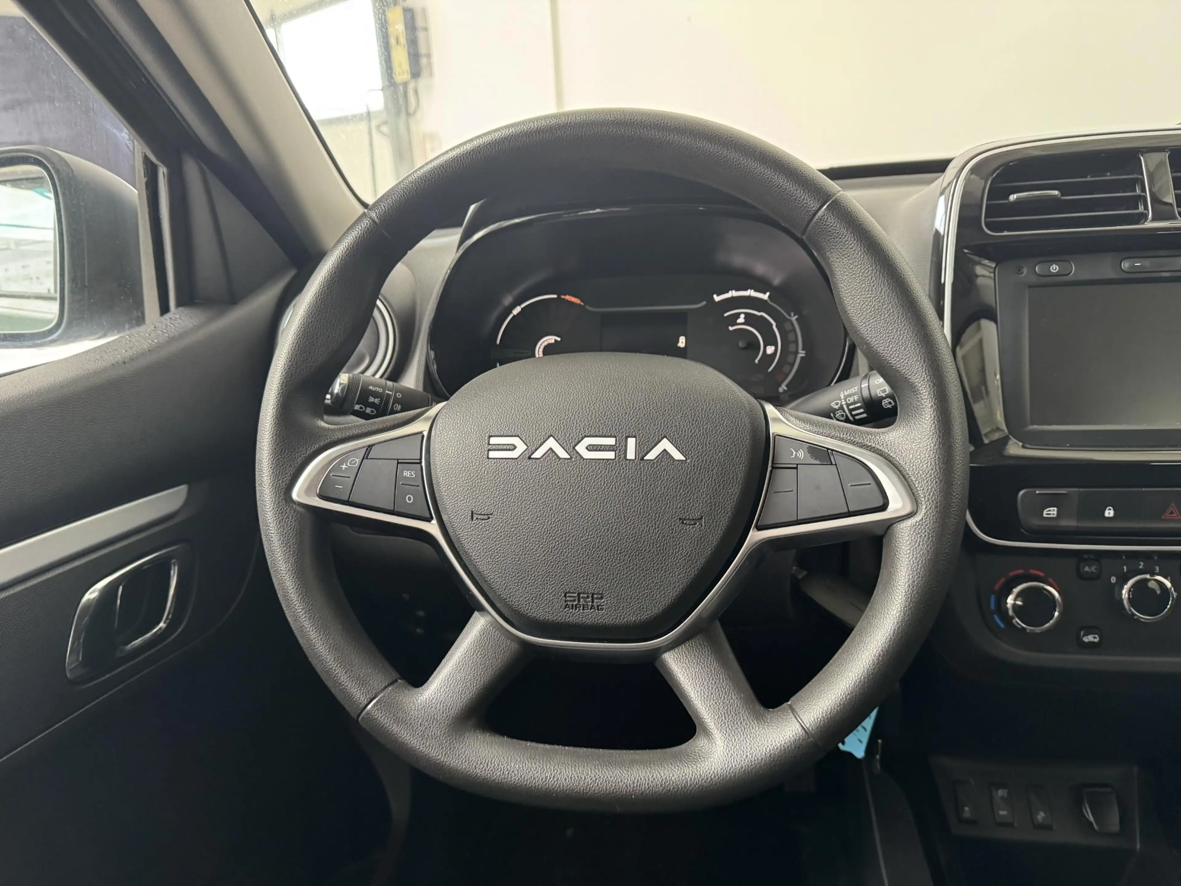 Dacia Spring Expression 27 kWh | Navigatie | Camera | Airco | — photo 14