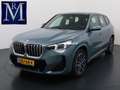 BMW iX1 xDrive30 67 kWh VAN € 41.900,- VOOR € 38.440,- UW Grün - thumbnail 1