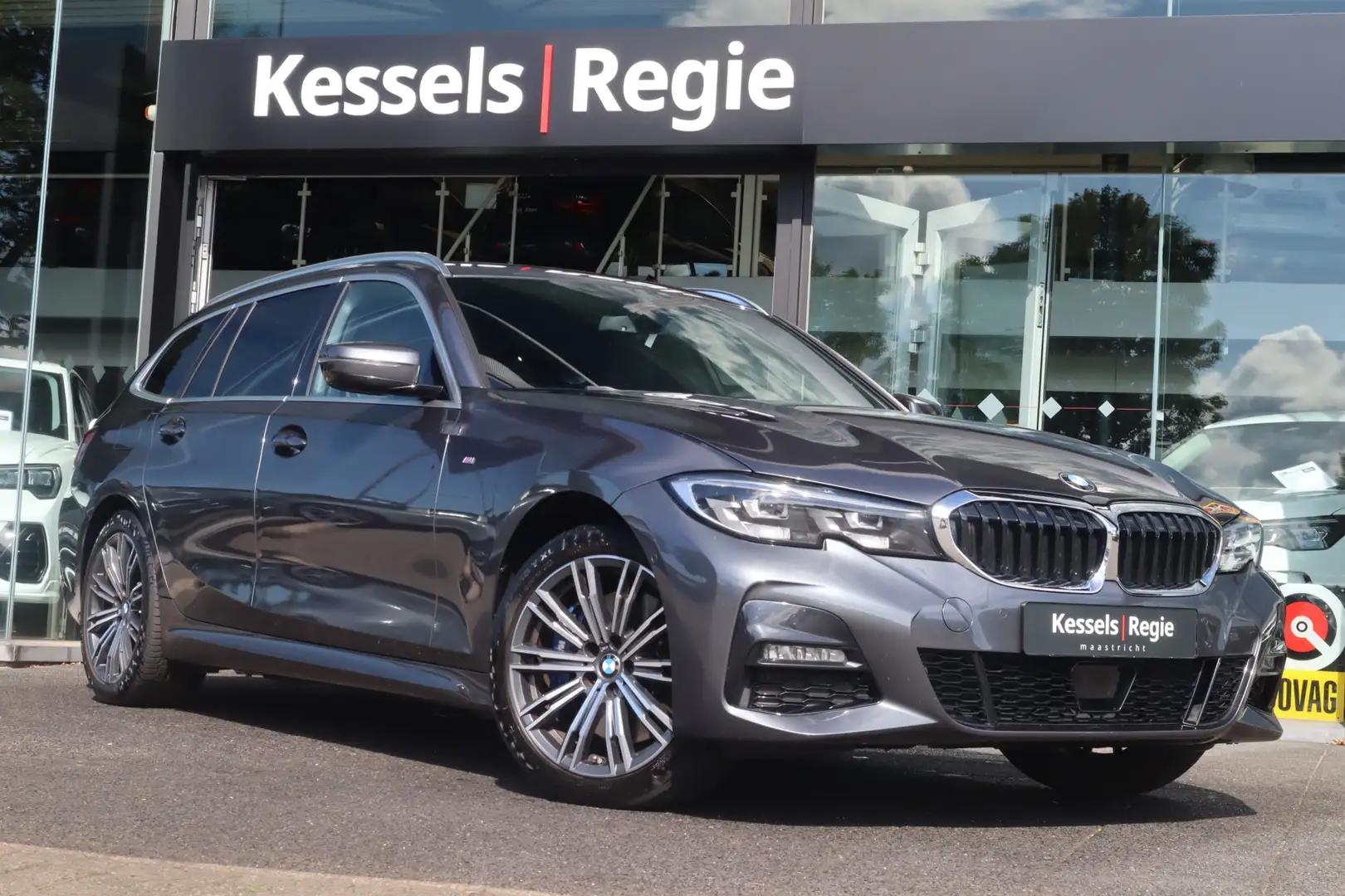 BMW 330 3-serie Touring 330e xDrive M-sport Elec.trekhaak Grijs - 1