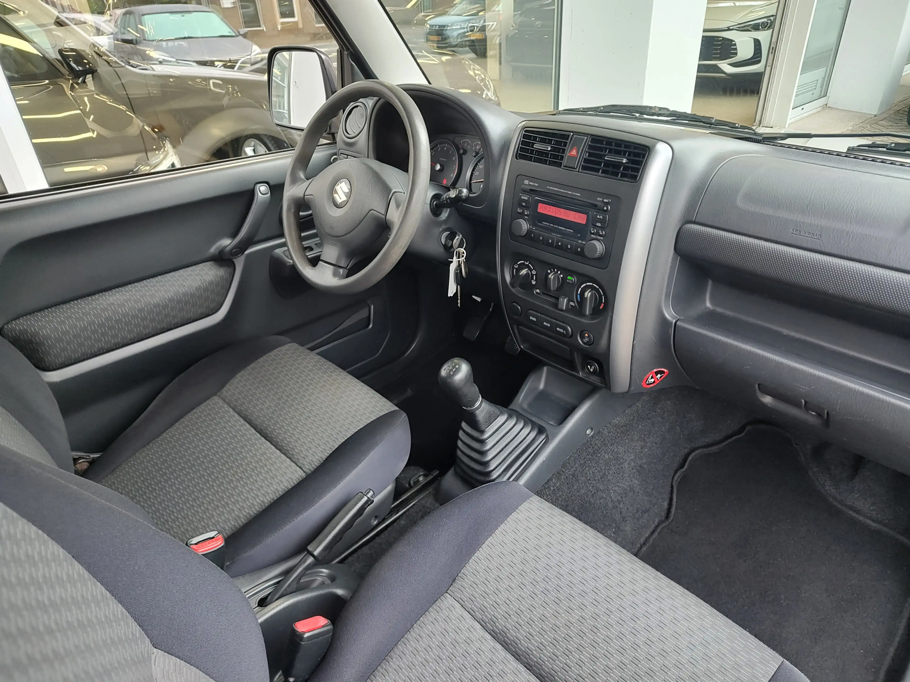 Suzuki Jimny 1.3 EXCLUSIVE Airco | Elek. ramen | 4-seizoenenban — photo 9