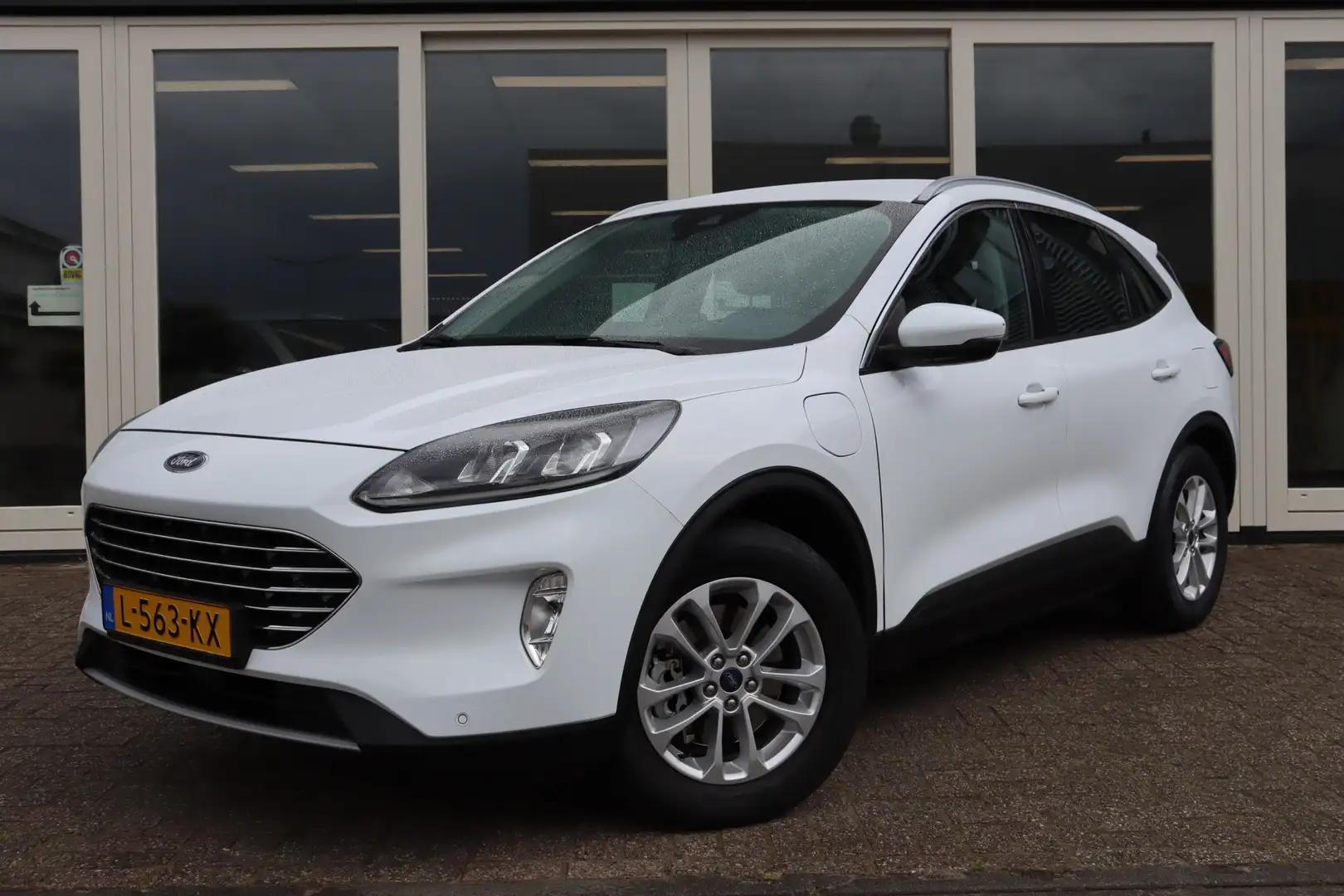Ford Kuga 2.5 PHEV,**Netto €13.850** Cruise Control, Airco, Blanco - 1