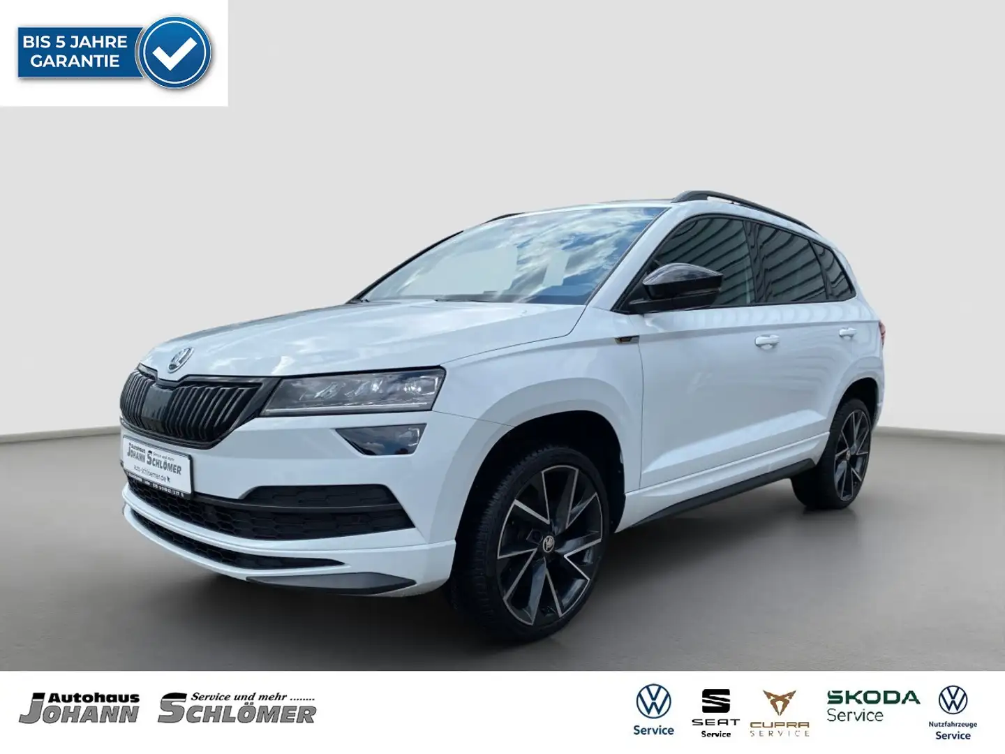 Skoda Karoq 1.5 TSI Sportline AHK NAVI KAMERA PANO ACC Klima Weiß - 1