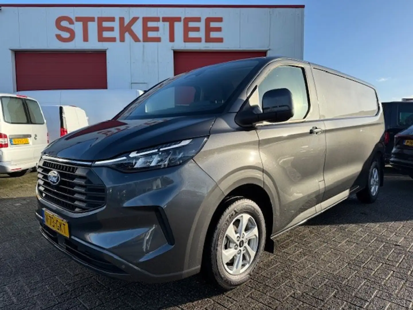 Ford Transit Custom 320 2.0 TDCI L2H1 Limited 136pk Automaat Grau - 1