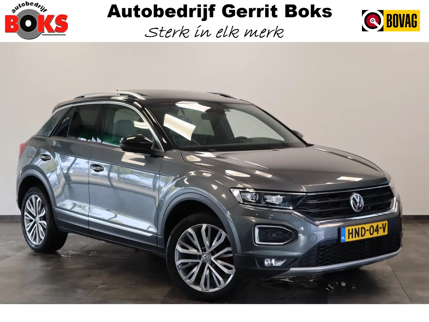 Volkswagen T-Roc 1.5 TSI Sport ACC PDC Navi Panoramadak Leder Autom Grijs - 1
