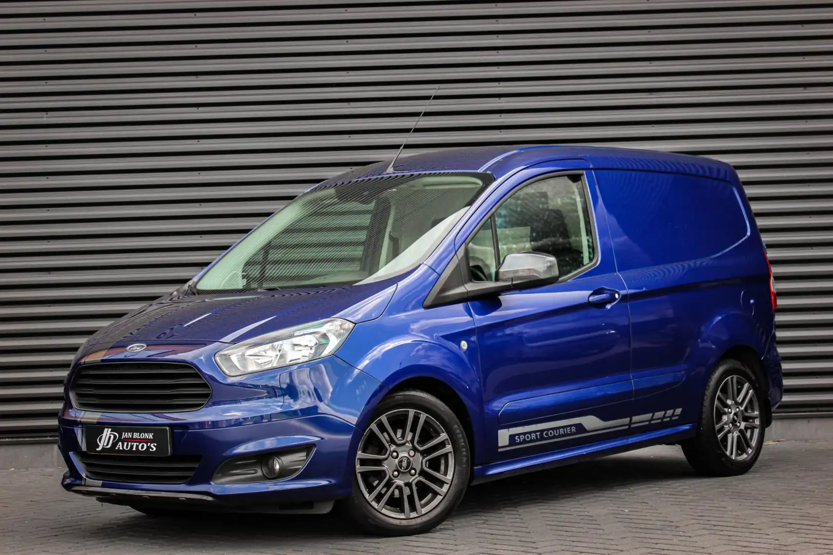 Ford Transit Courier 1.5 TDCI Sport 95PK / NAVIGATIE / LM.VELGEN / 95DK Blauw - 1