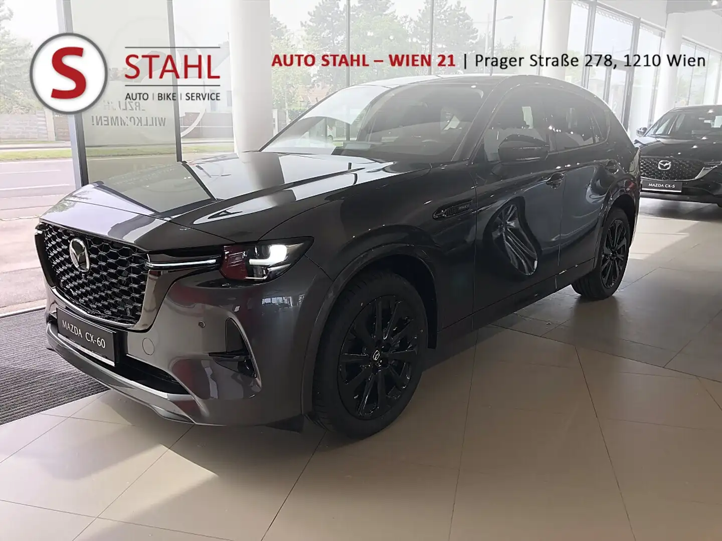 Mazda CX-60 2.5L e-SKYACTIV PHEV AWD HOMURA PLUS Aut. | AUT... Grau - 1