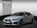 BMW i4 Gran Coupé eDrive40 M Sportpakket | Verwarmde Voor Grijs - thumbnail 1