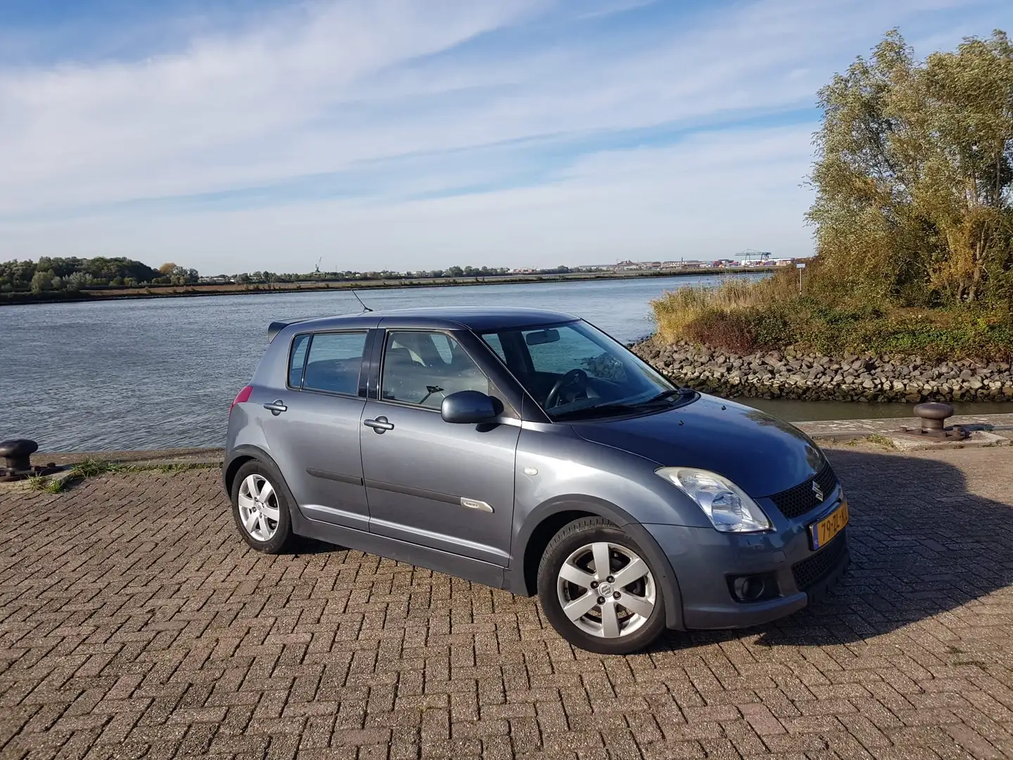 Suzuki Swift 1.3 Shogun Grijs - 1