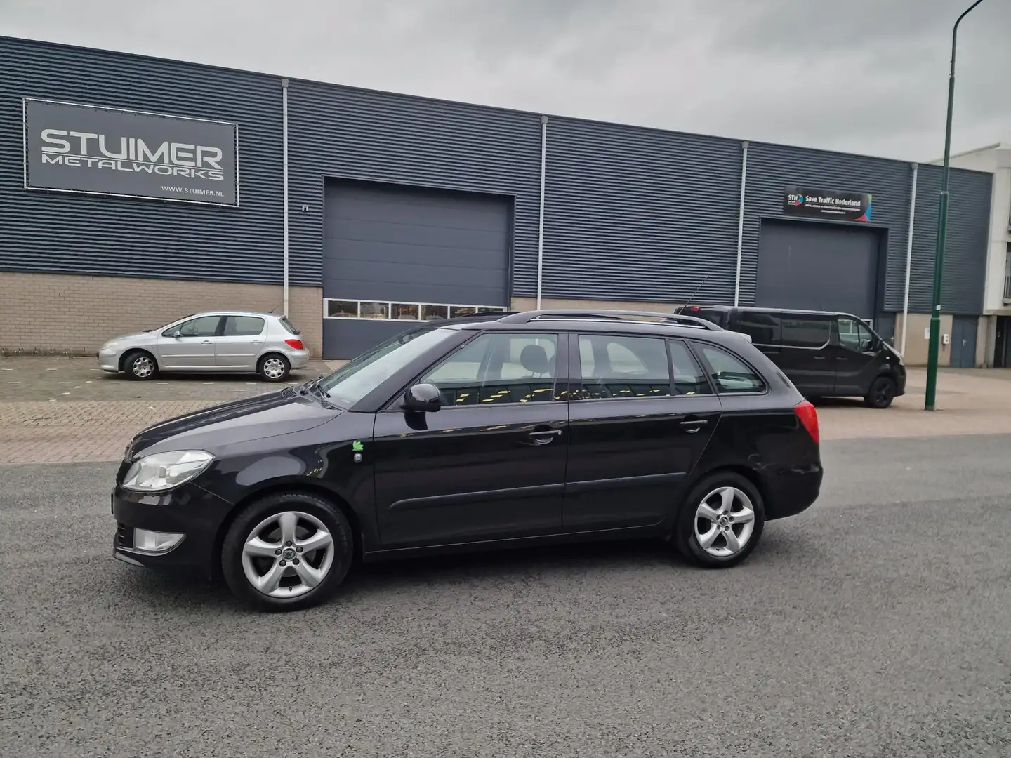 Skoda Fabia Combi 1.2 TDI Greenline NAVI PSENSOR TREKHAAK 3 X Zwart - 2