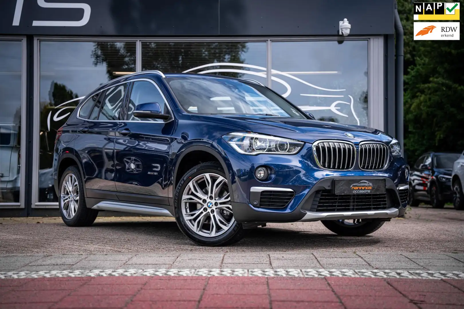 BMW X1 SDrive18i Executive |Navi|Cruise|18"LMV|Camera Blauw - 1