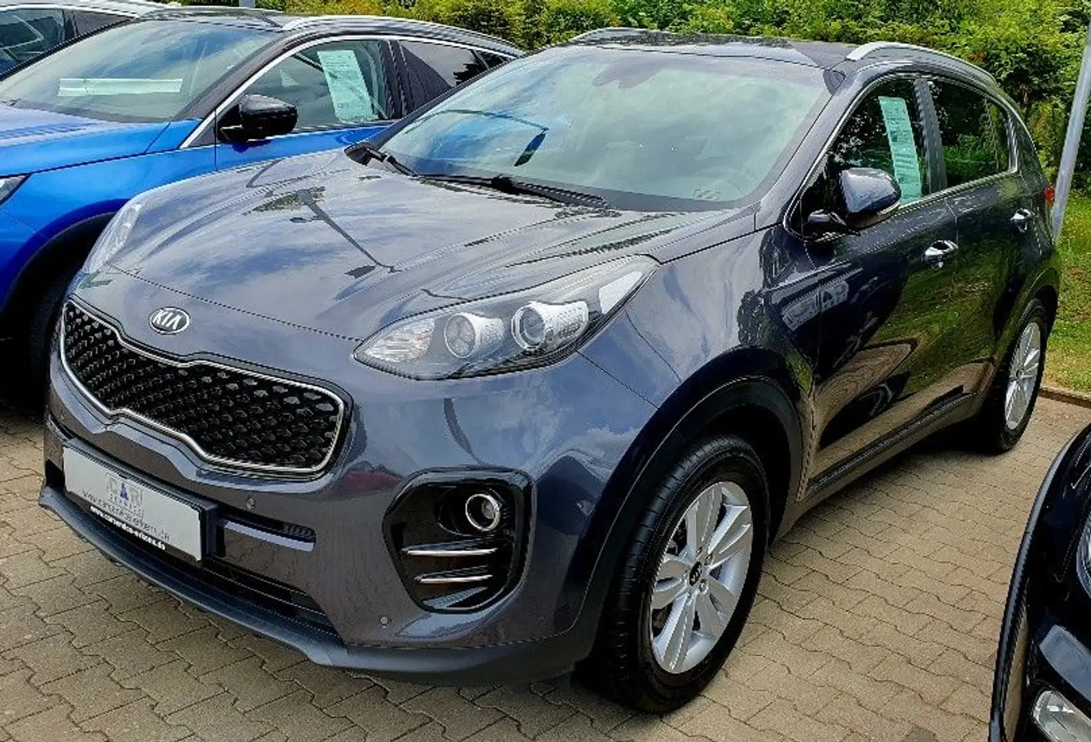 Kia Sportage Dream Team Premium + 2WD Assistenzsyste Grijs - 1