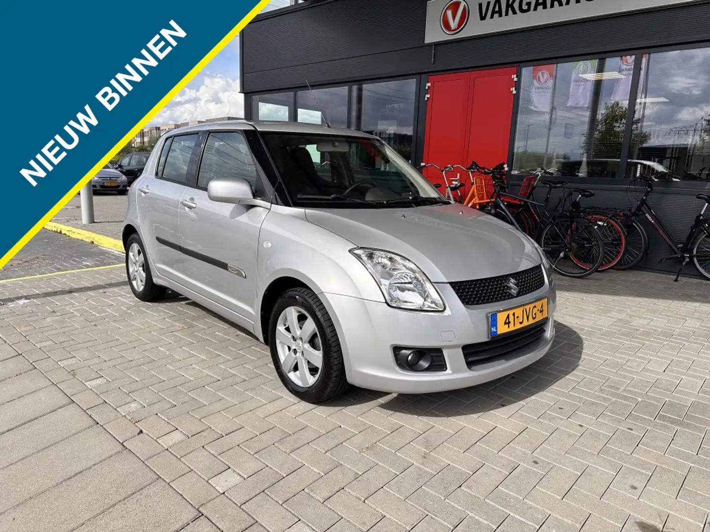 Suzuki Swift 1.3 BANDIT 5-DRS. Grijs - 1