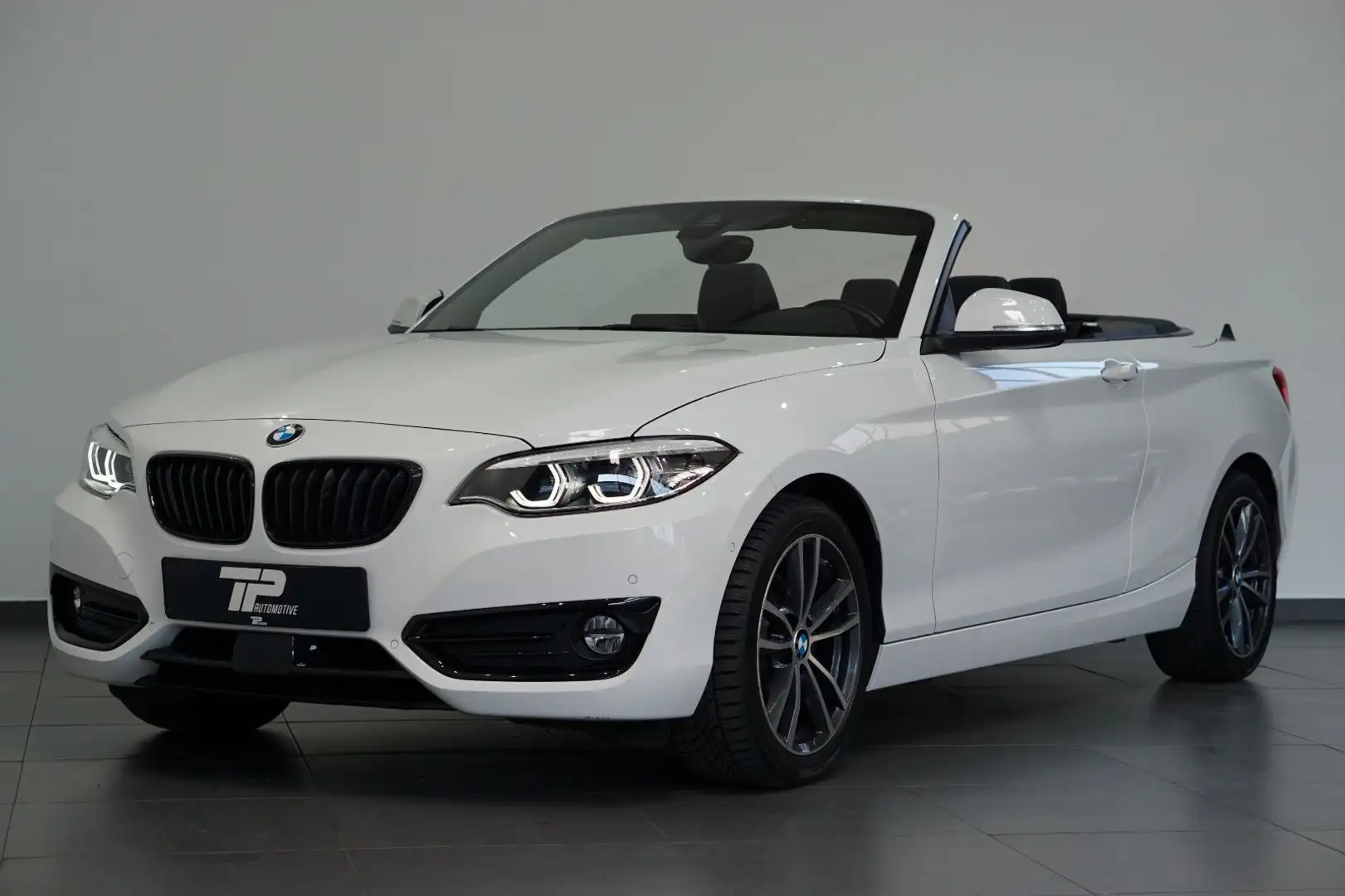 BMW 220 i Cabrio Aut. Sport Line *Leder *LED *Navi Wit - 1