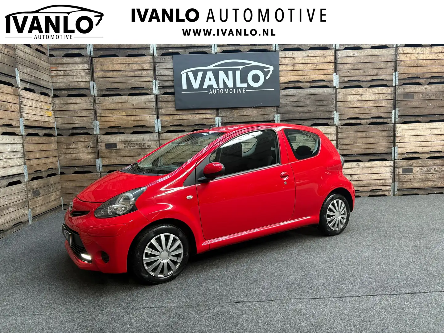 Toyota Aygo 1.0 VVT-i Navigator Airco Elektrisch pakket Rosso - 1
