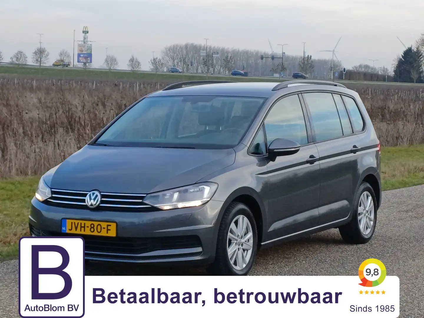 Volkswagen Touran 1.5 TSI Comfortline Business 7p / Cruisecontrol / Grau - 1