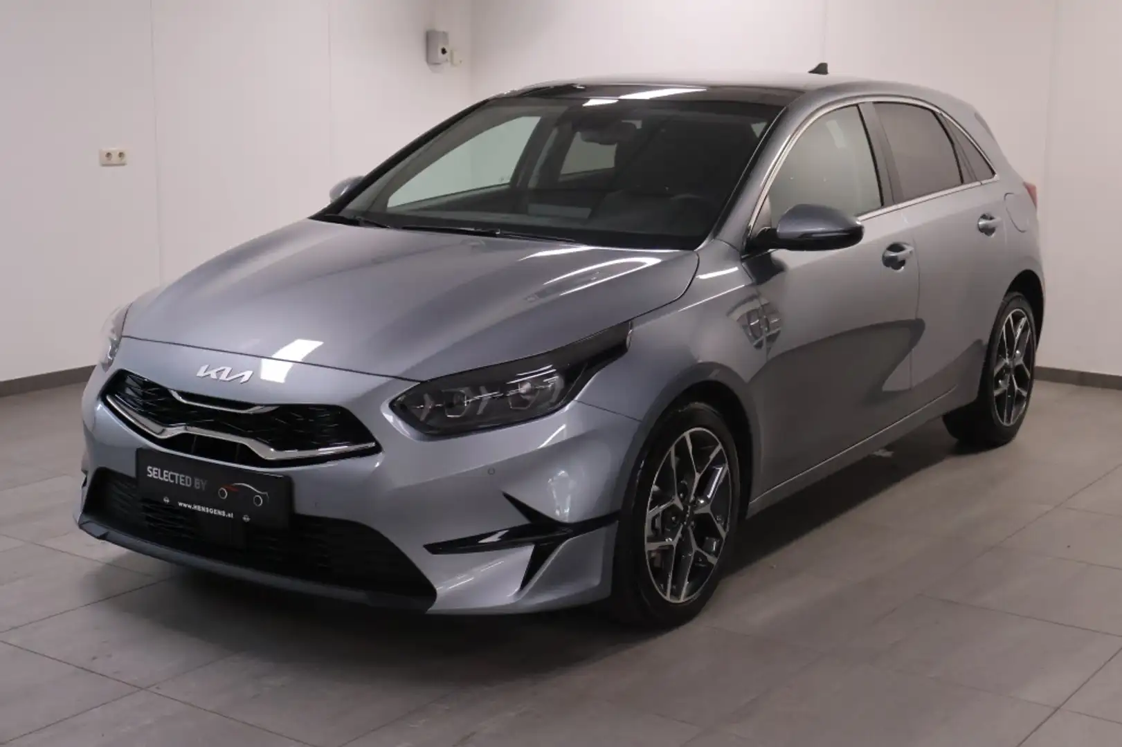 Kia Ceed / cee'd 1.0 T-GDi MHEV Limited Edition | Bomvol! | 1e Eige Grijs - 1
