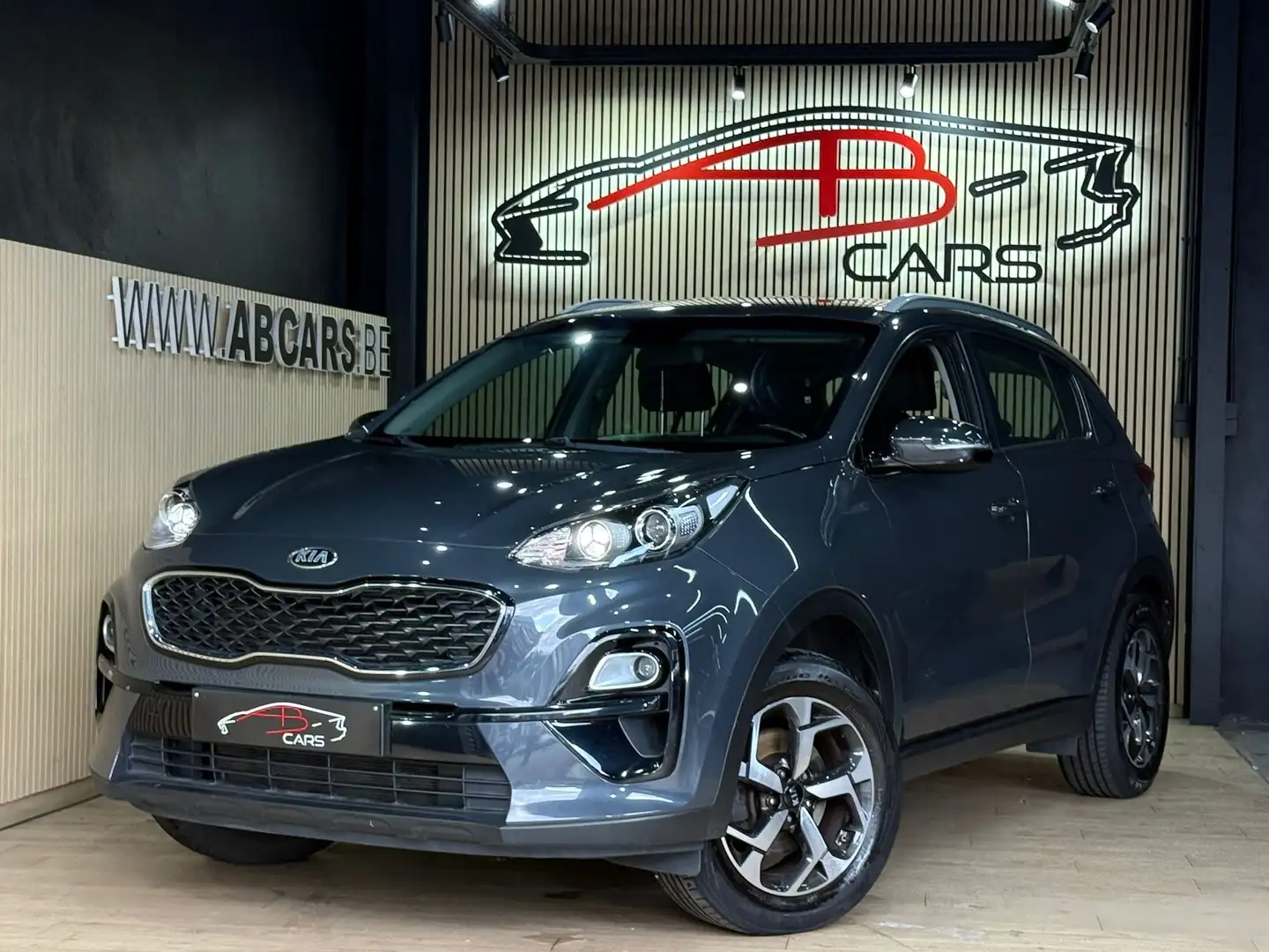 Kia Sportage 1.6i * SPORT * GARANTIE 12 MOIS * 1ER PROPRIO * Gris - 1