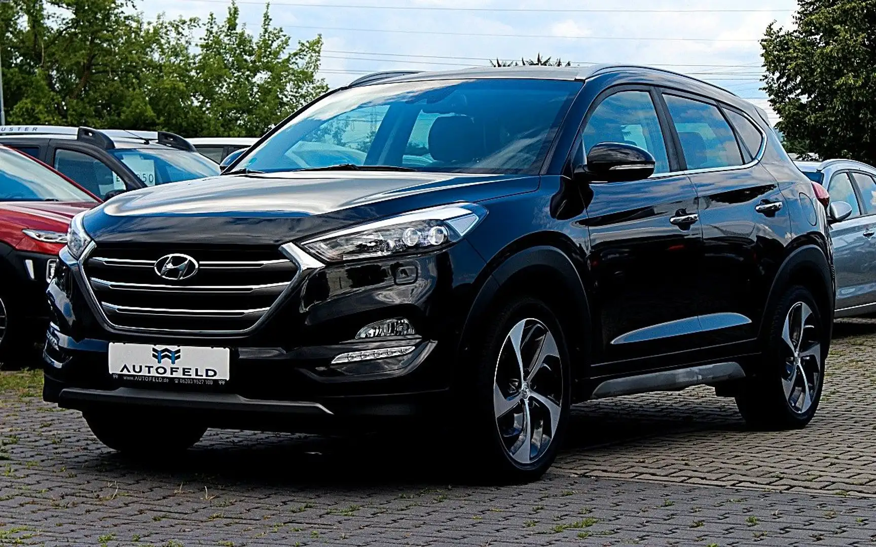 Hyundai TUCSON 1.6/VOLL SHEFT/NAVI/LEDER/LED/RCAM/BT Negro - 1