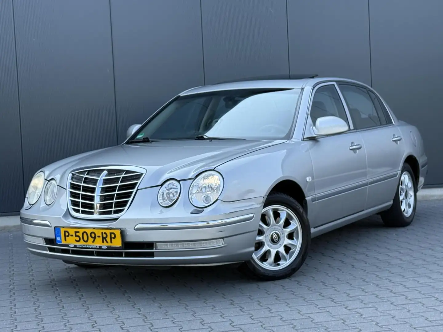 Kia Opirus 3.5 V6 LPG/G3 - Schuifdak - Leder - Xenon - Unieke Grijs - 1