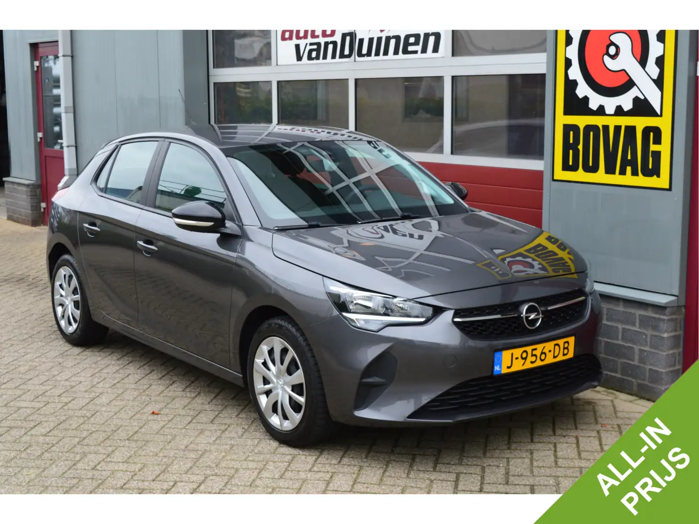 Opel Corsa 1.2 Edition O.a: Airco, Navi, Cruise, Carplay, DAB Grijs - 1
