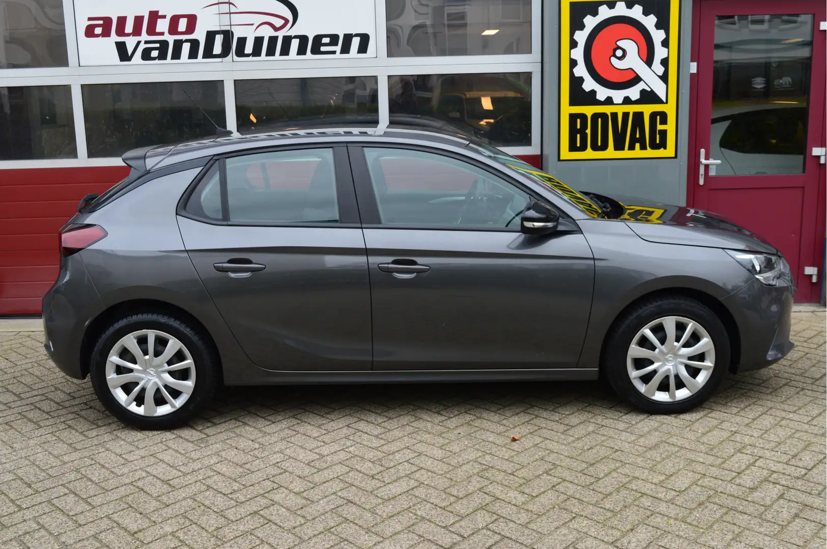Opel Corsa 1.2 Edition O.a: Airco, Navi, Cruise, Carplay, DAB Grijs - 2
