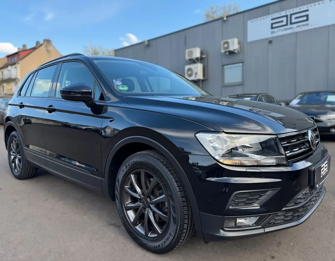 Volkswagen Tiguan 1.5 TSI *1.Hand/Navi/PDC/17"Alus* Negro - 1