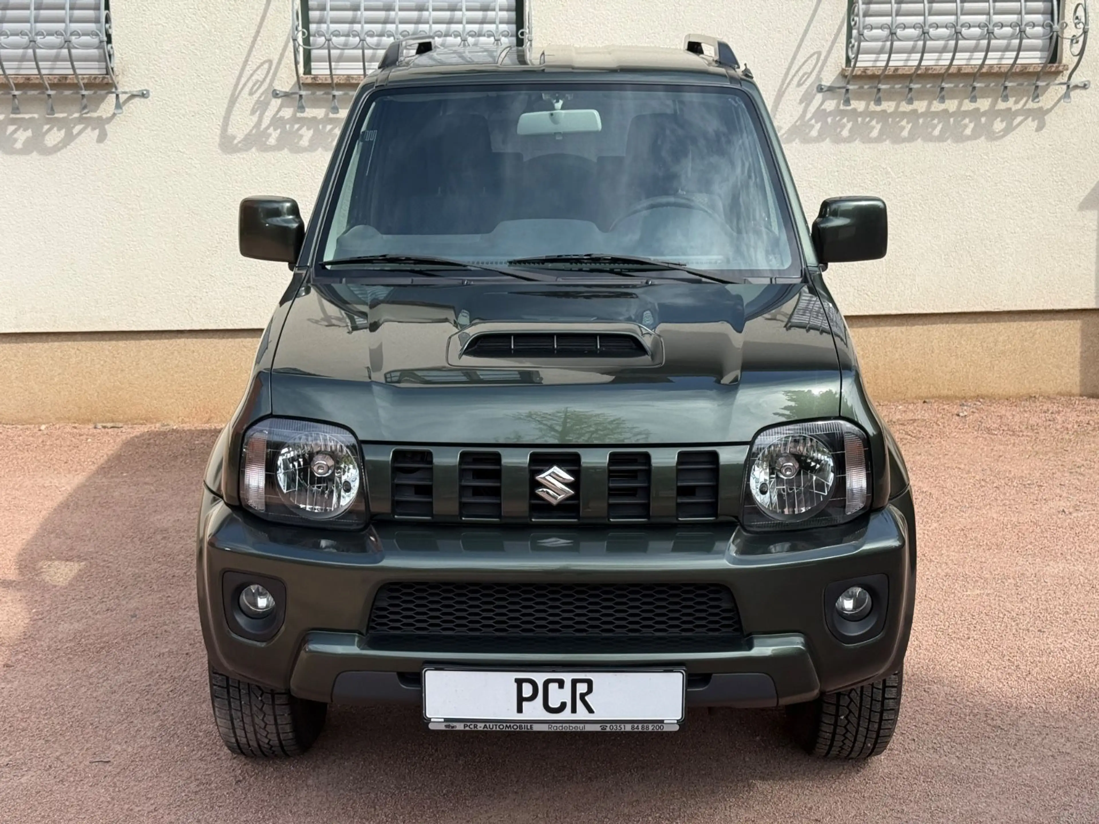 Suzuki Jimny KLIMA AUTOMATIK SHZ 2.Hand gepflegt AHK — photo 2
