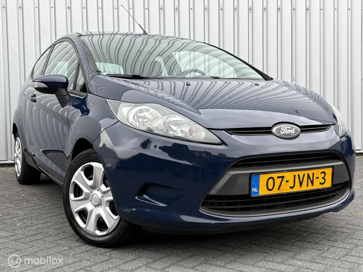 Ford Fiesta 1.25 Limited | Airco | Nap | Nieuwe apk | 2009 | Blauw - 1