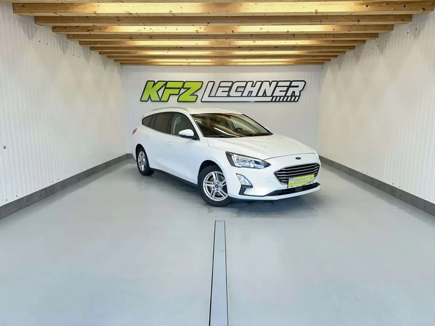 Ford Focus Turnier 1,5 EcoBl. ''AHK*NAVI*SITZH*LED*R-KAM Weiß - 1