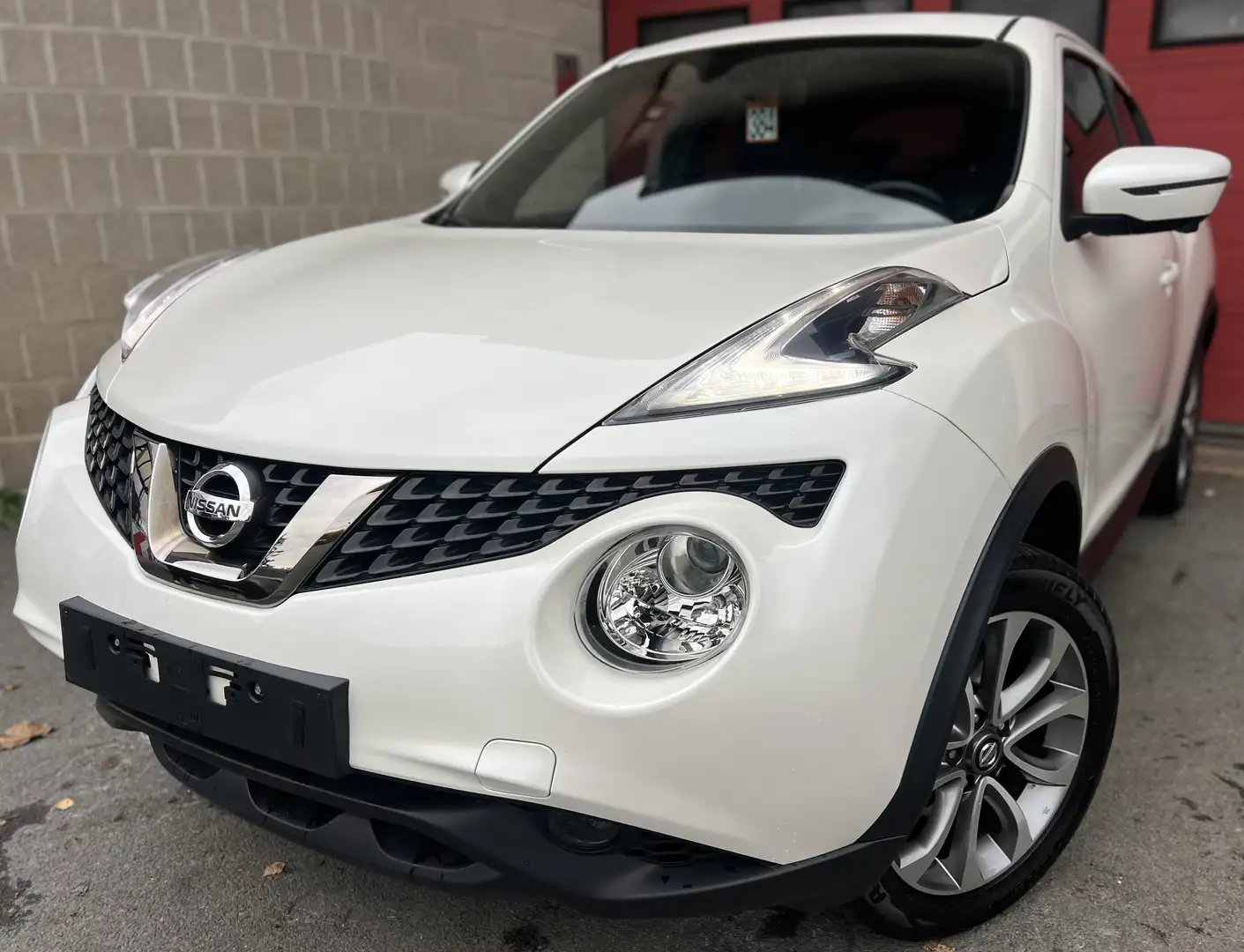 Nissan Juke 1.6i 2WD BOSE PERSONEL + NAVI + CAMÉRA + CUIR Wit - 1