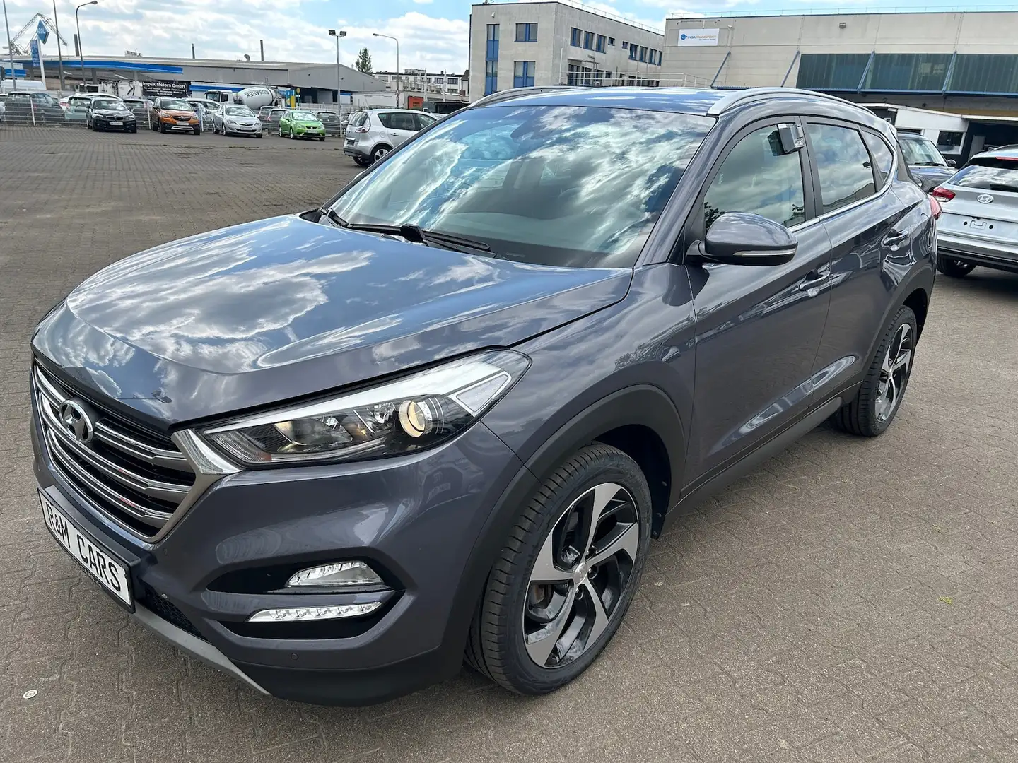 Hyundai TUCSON Automatik 4WD Navi Kamera Style Premium Grey - 1