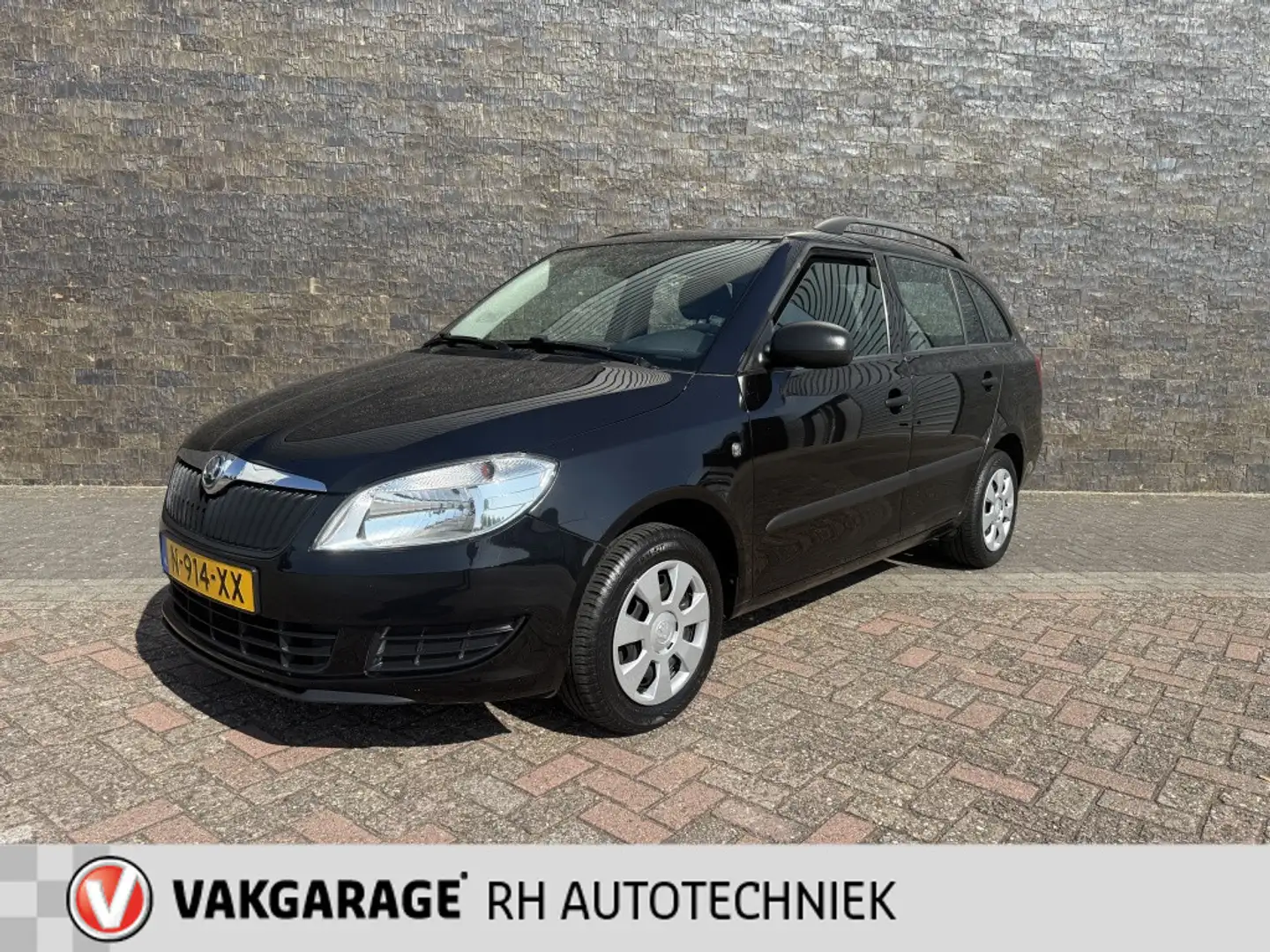 Skoda Fabia 1.2 Go Zwart - 1