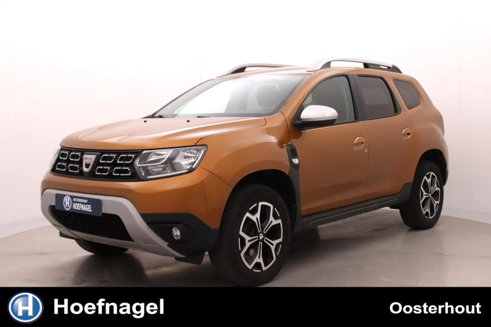 Dacia Duster 1.3 TCe Prestige | Trekhaak | Camera | Parkeersens Oranje - 1