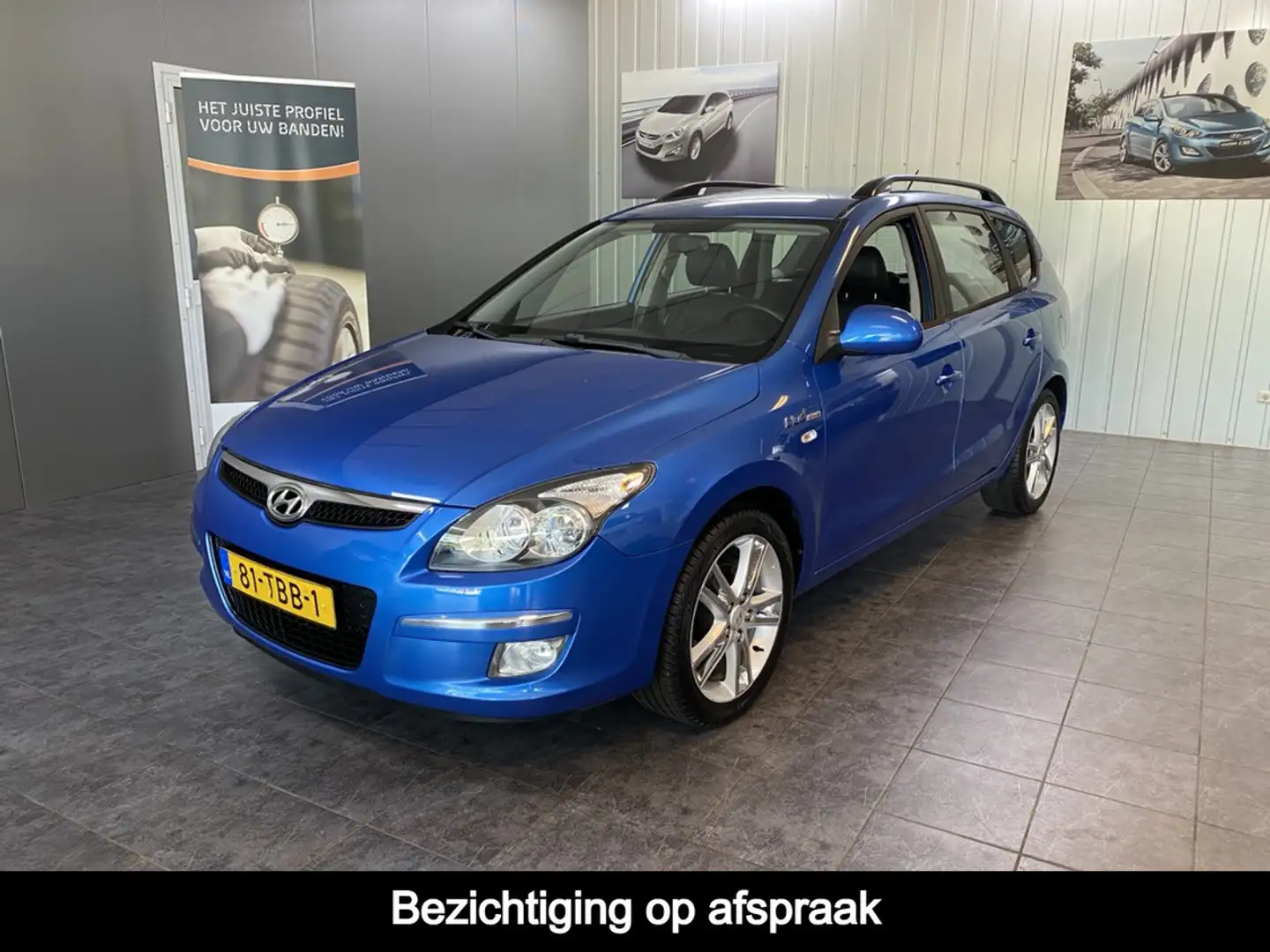 Hyundai i30 CW 1.6i i-Motion Business Climate control, Parkeer Bleu - 1