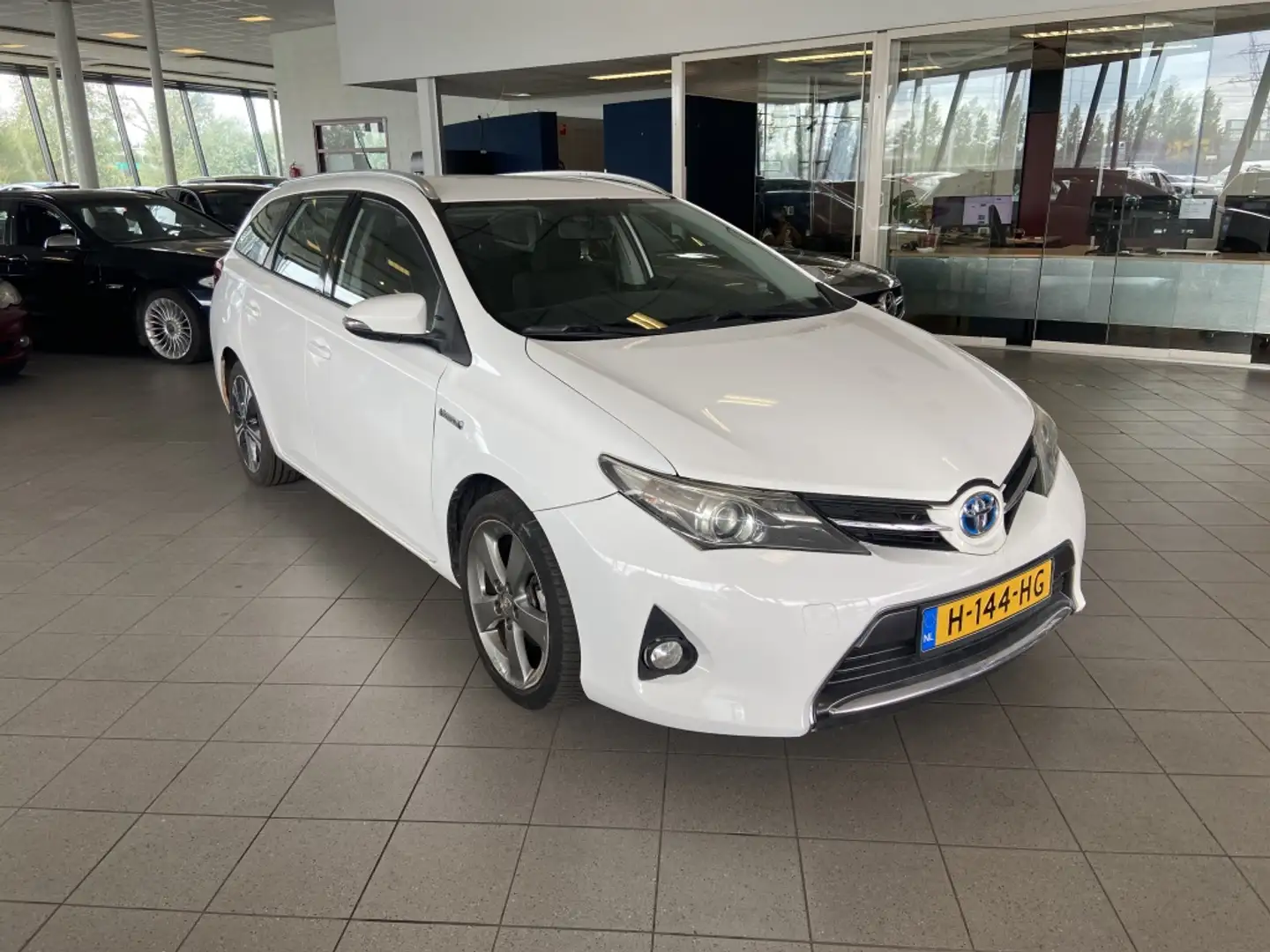 Toyota Auris Touring Sports 1.8 Hybr. Aspiration Wit - 1
