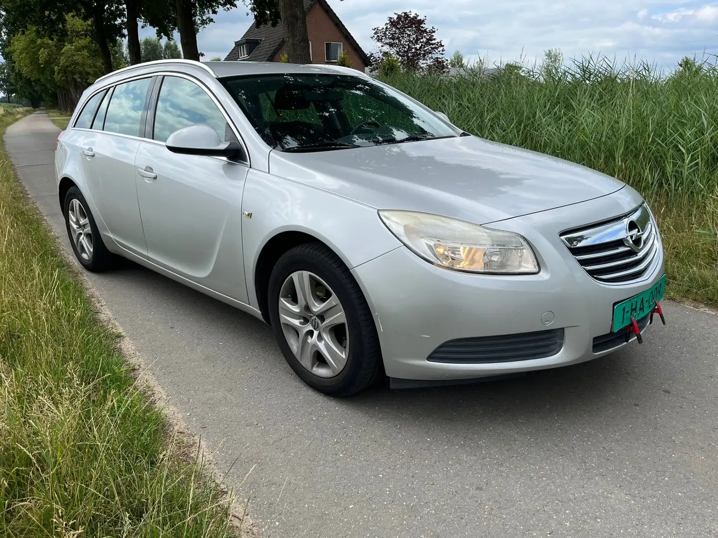 Opel Insignia Sports Tourer 1.8 Edition KOPPAKKING DEFECT! EXCL. Grijs - 2