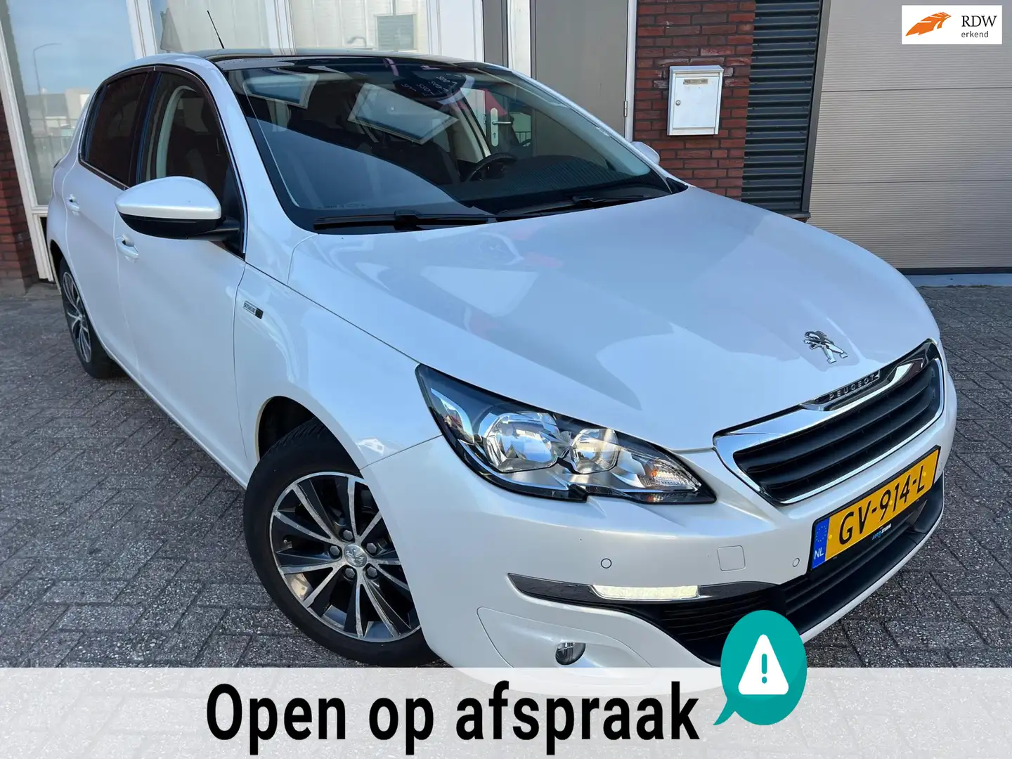 Peugeot 308 1.2 PureTech Style / Pano / Navi / PDC / Camera / Wit - 1