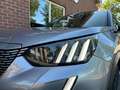 Peugeot e-2008 EV GT Pr. 50 kWh STOELVERW. / CAMERA / PANODAK / S Grau - thumbnail 17