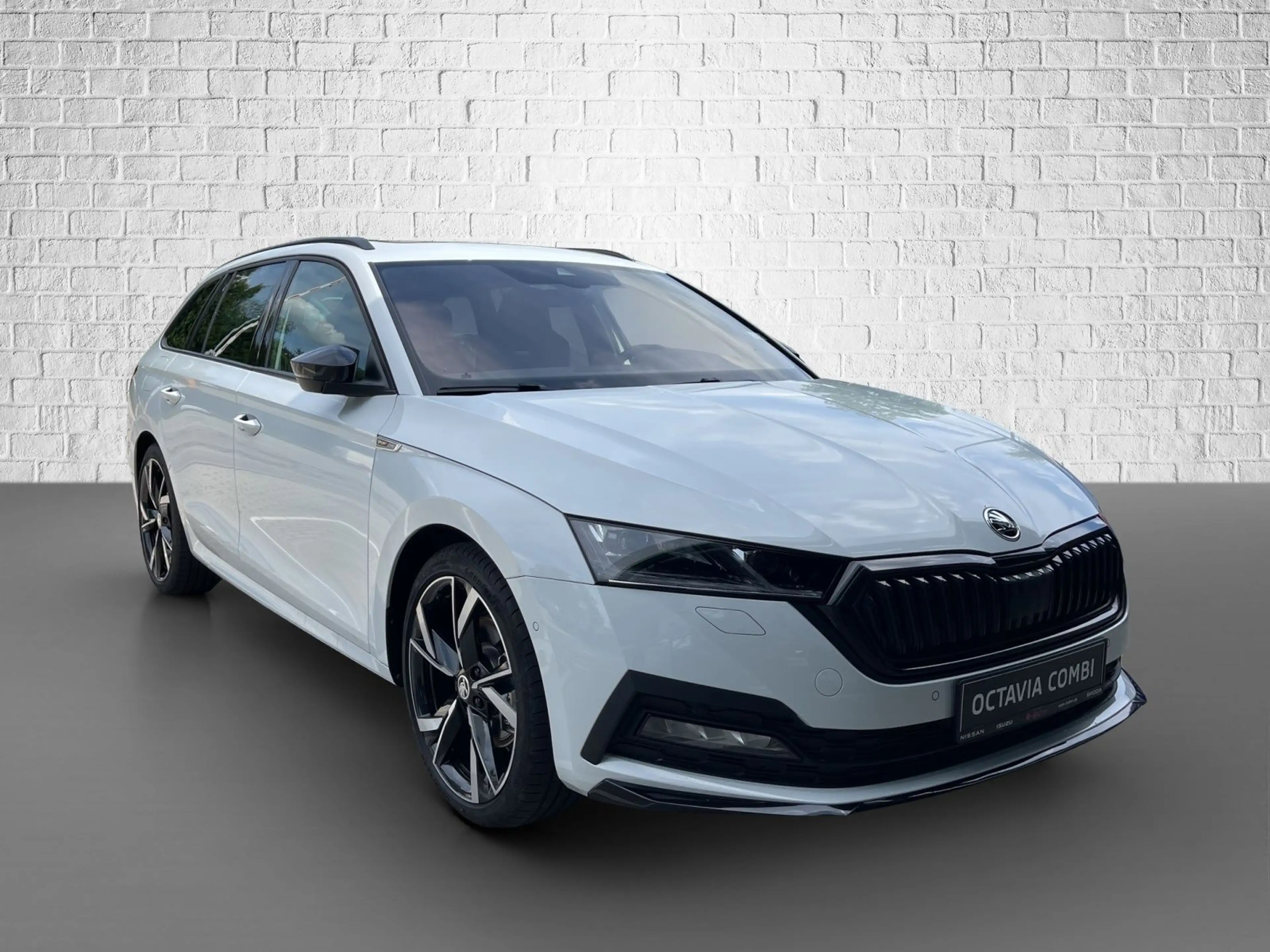 Skoda Octavia Combi 2.0 TSI DSG 4x4 - Sportline — photo 7
