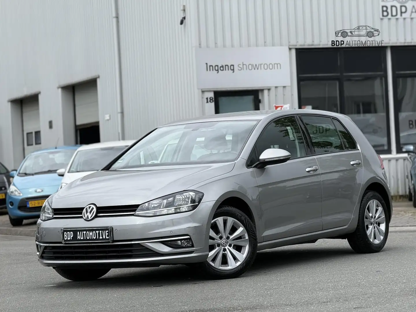 Volkswagen Golf 1.0 TSI Comfortline CRUISE ADAPTIEF/PDC V+A/NAVI/B Gris - 1