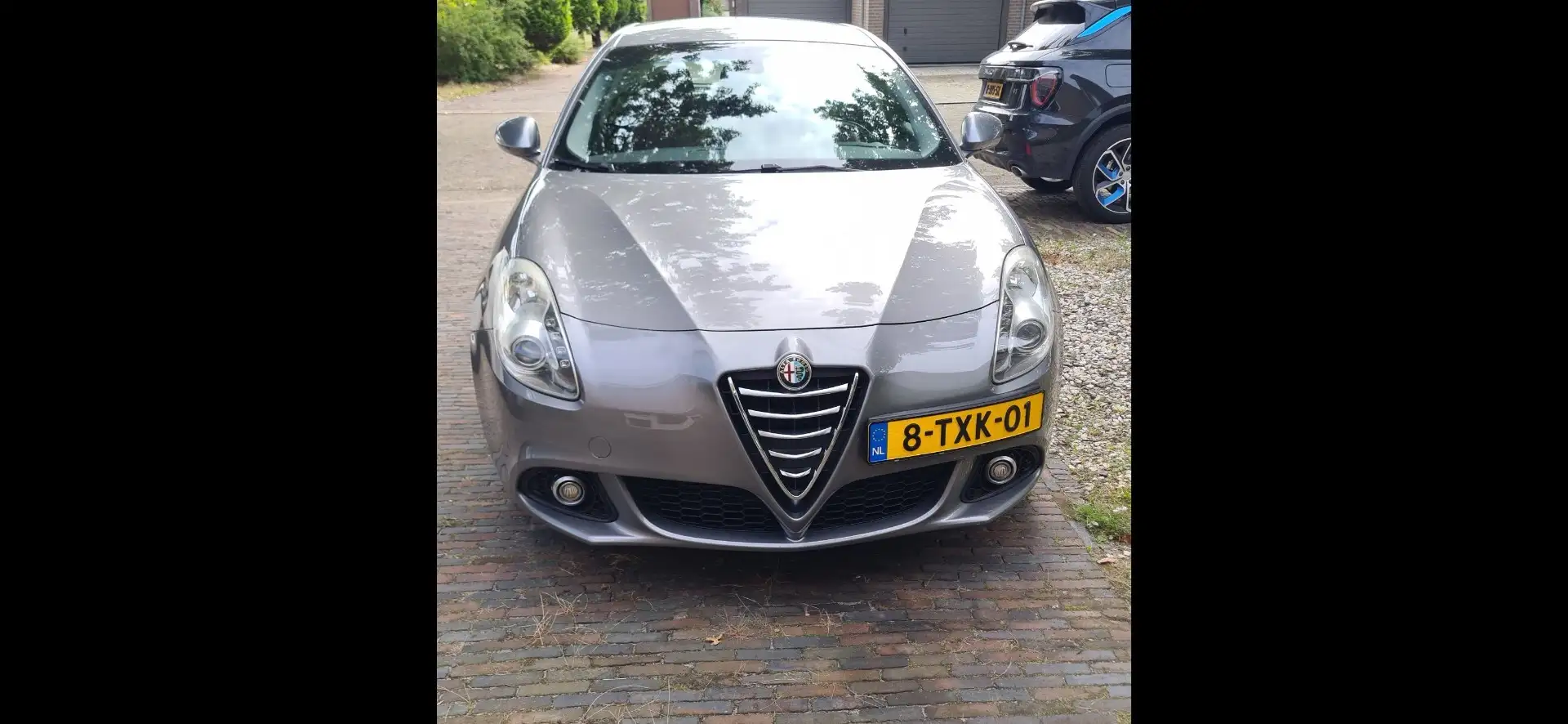 Alfa Romeo Giulietta 1.4 T Dist. Lusso Grijs - 2