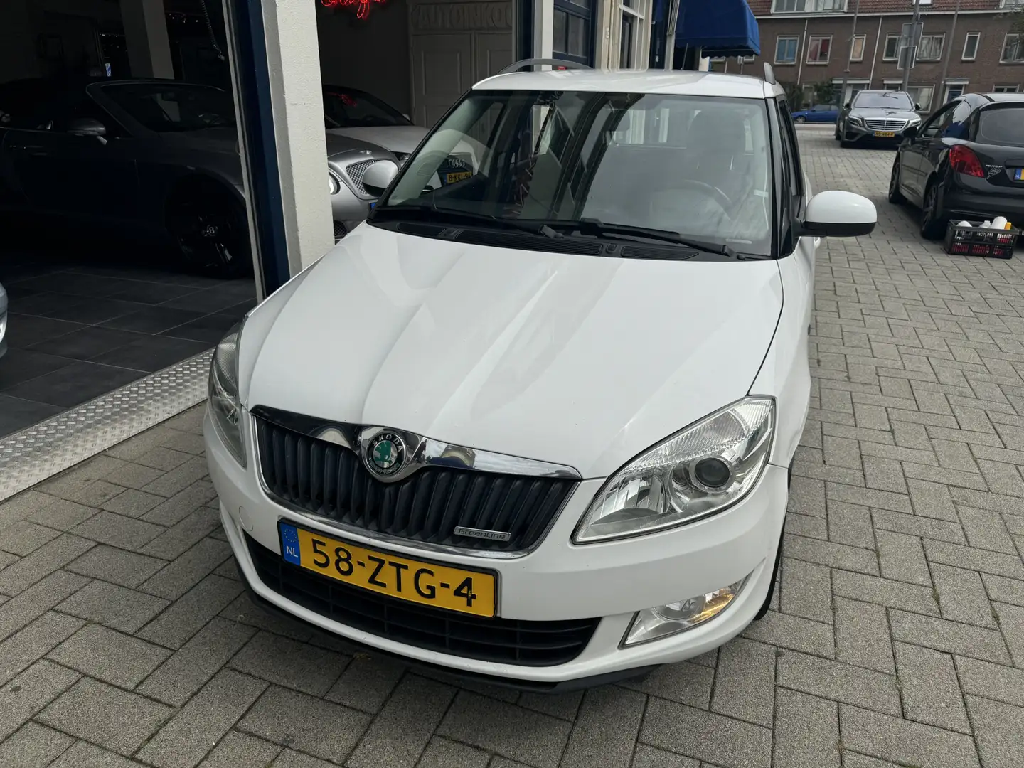 Skoda Fabia Combi 1.2 TDI Businessline NAVI/CLIMA/CRUISE/PDC Wit - 2