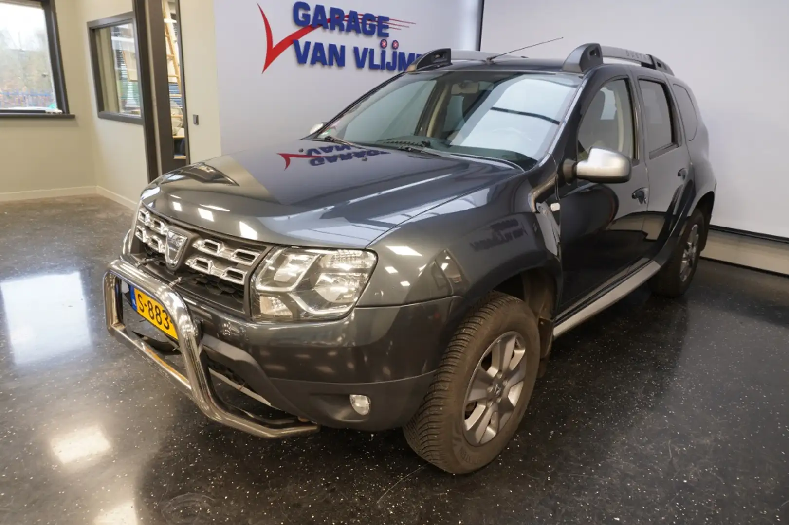 Dacia Duster 1.6 SCe Chroom Bull bar/trekh/navi/Cam/Cr control Gris - 1